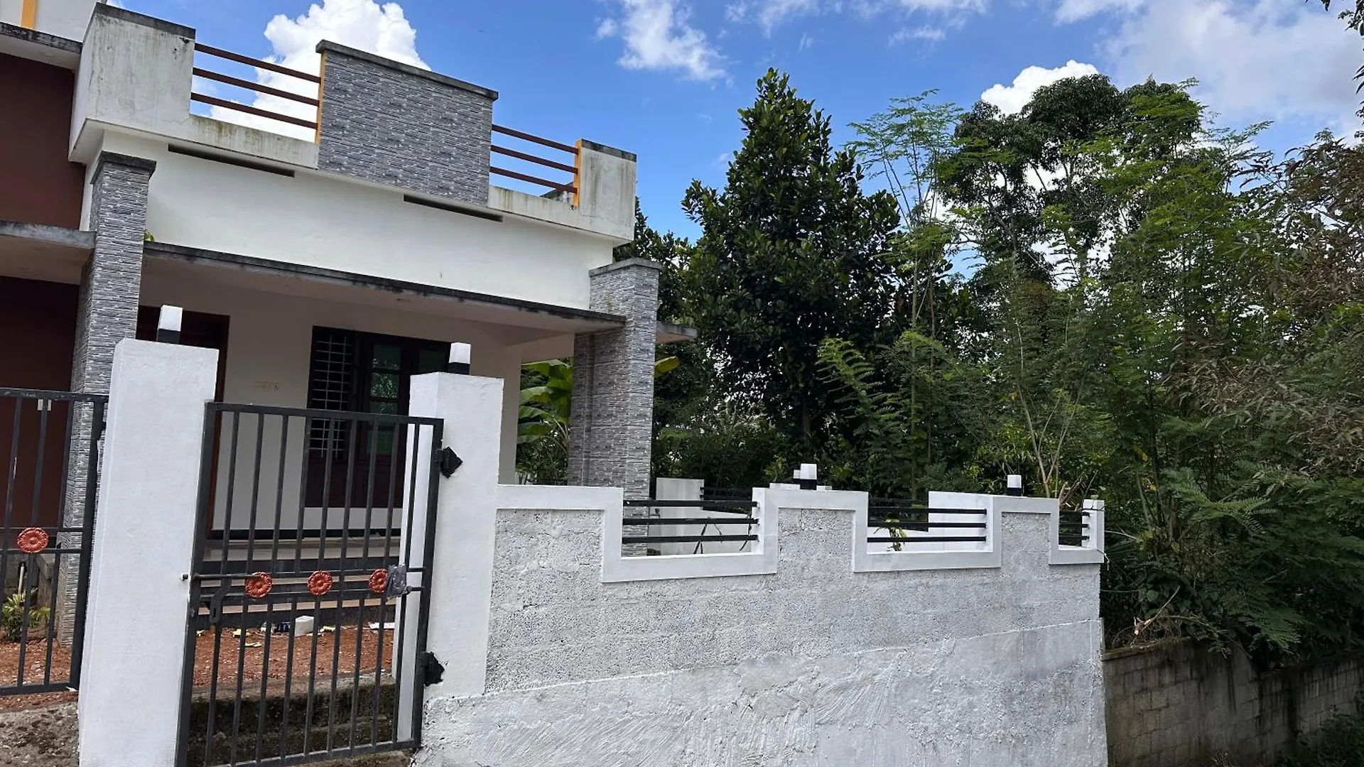 בית נופש טריואנדרום Kattil Farm Stay Varkala
